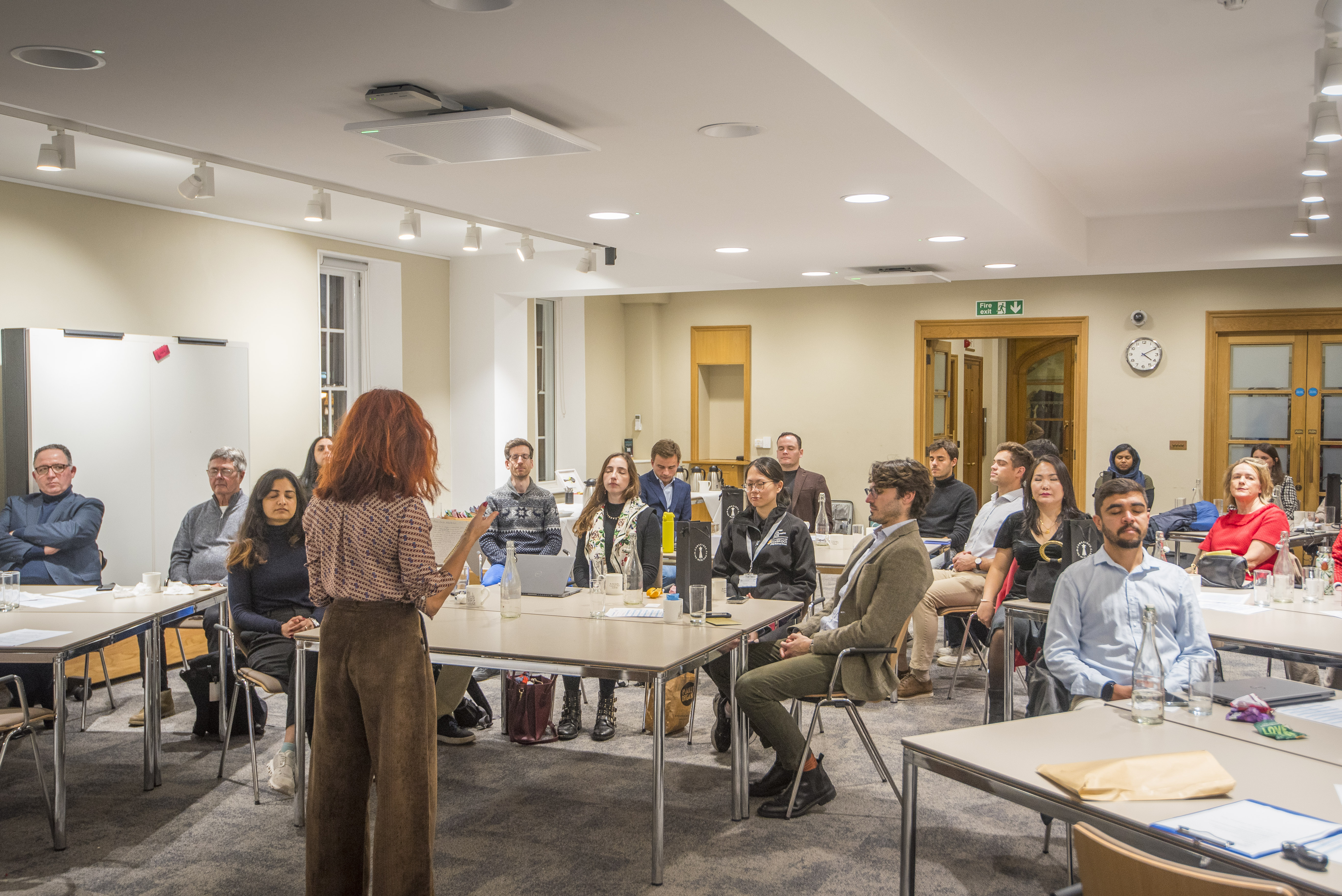 Adriana Welham speaking to a full room at the University of Cambridge